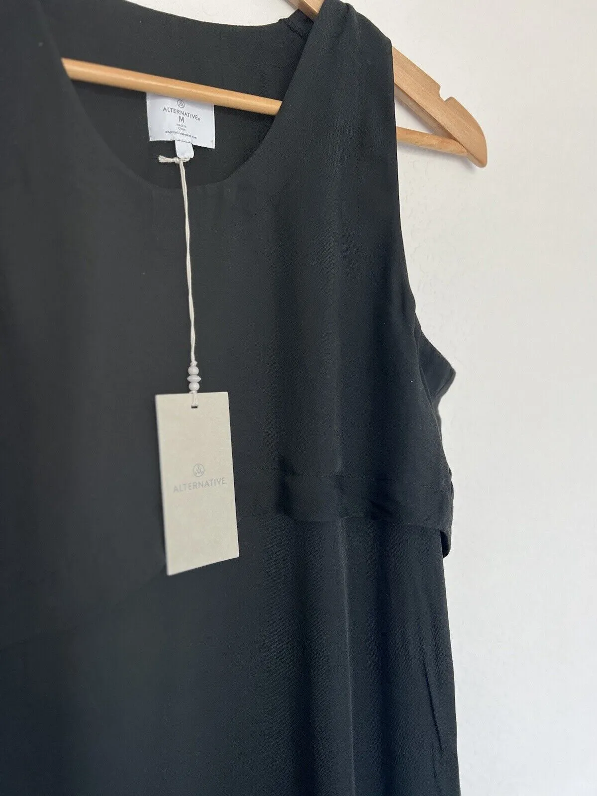 ALTERNATIVE NWT Classic Black Shift Dress Sz M Asymmetric Double Hem Sleeveless